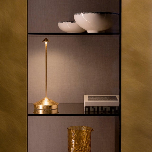 Pina Pro Battery-operated and rechargeable portable table lamp. The lamp features dimming touch control and has 3-CCT...