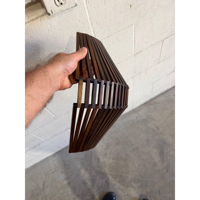 Beautiful vintage Danish modern sculptural fruit bowl crafted in richly grained rosewood. The bowl features a striking...