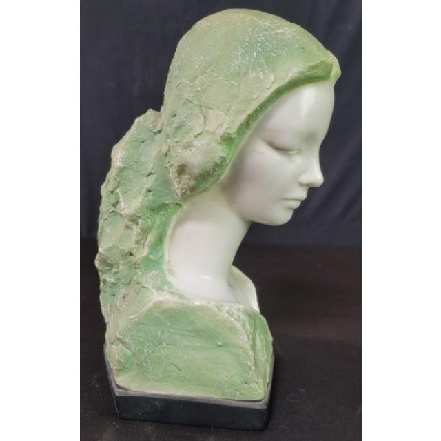 Add a serene, classic Mid-Century Modern focal point to your decor with this original 1960s vintage cast-stone bust by the...
