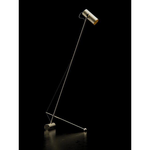 Reconfigurable floor lamp with brass structure. The elastic bend allows the lamp to be tilted at will European Plug (up to...