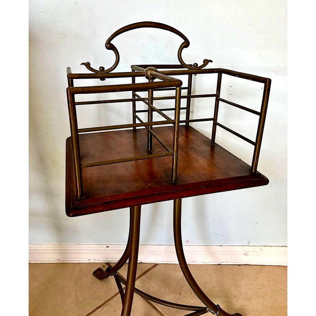 Fabulous Edwardian revolving bookstand. I believe this is from the late 19th century. Beautifully curved legs and feet....
