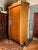 19th Century Biedermeier Fruitwood Armoire with Dolphin Carvings and Gilt Detail For Sale - Image 6 of 11