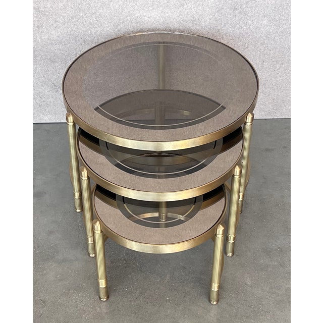 Metal Set of Three Round Brass Nesting Tables With Smoked Pink Glass Tops For Sale - Image 7 of 12
