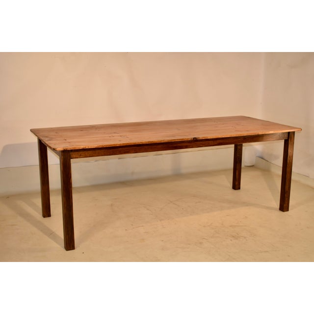 Late 19th century farm table from England. The top is made from three pine planks and has the wonderful character from...