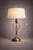 Graceful and architectural, this vintage table lamp features an elongated scrollwork form finished in a refined sunlit...