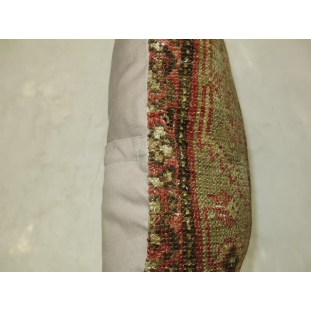 Pillow made from a pale persian malayer rug