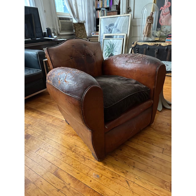 I have lived with these for many years. They came from a French dealer here in New York. these are called mustache chairs....