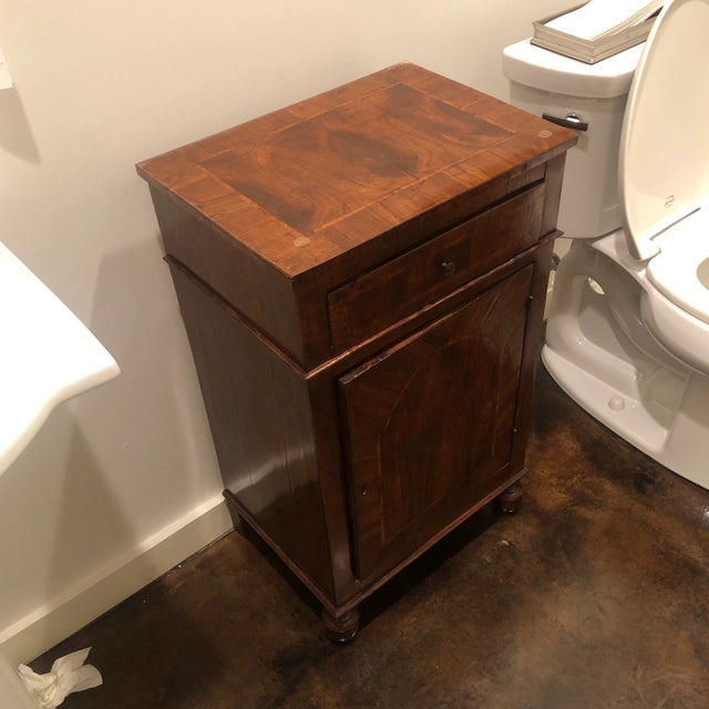 Adorable Antique diminutive cabinet with one drawer and one door in walnut with inlays. Italy.