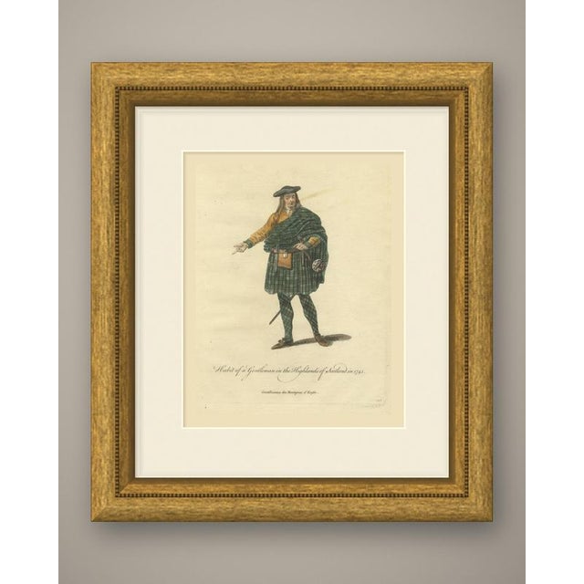 This is an original antique copper engraving with hand coloring, lettered in script "habit of a gentleman in the highlands...