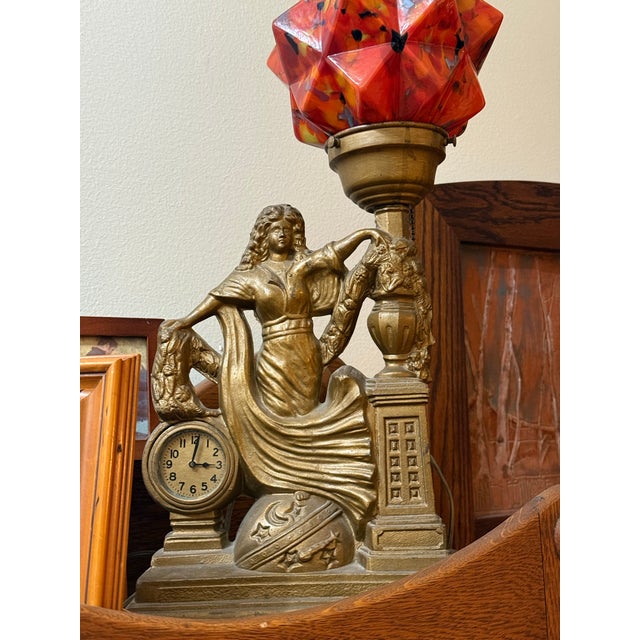 This is an antique Art Deco figural spelter lamp. This style was popular in the 1920s and 1930s and features a female...