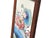 This elegant Chinese porcelain plaque, set within a slender dark wood frame, depicts a classic "egret and lotus" motif, a...