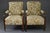 A refined pair of British lounge chairs, dating from the late Victorian to early Edwardian period (circa 1890–1910). These...