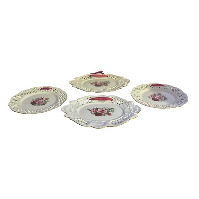 A Set of 4 Vintage Formalities by Baum Brothers, part of the Victorian Rose collection. This gorgeous set of four pierced...