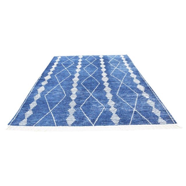 Moroccan Modern Hand-knotted with care using traditional rug-making techniques, this wool rug blends timeless...