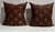 Pair of Schumacher Rubia pillows backed in solid brown. Down filled with zipper detail on the solid side