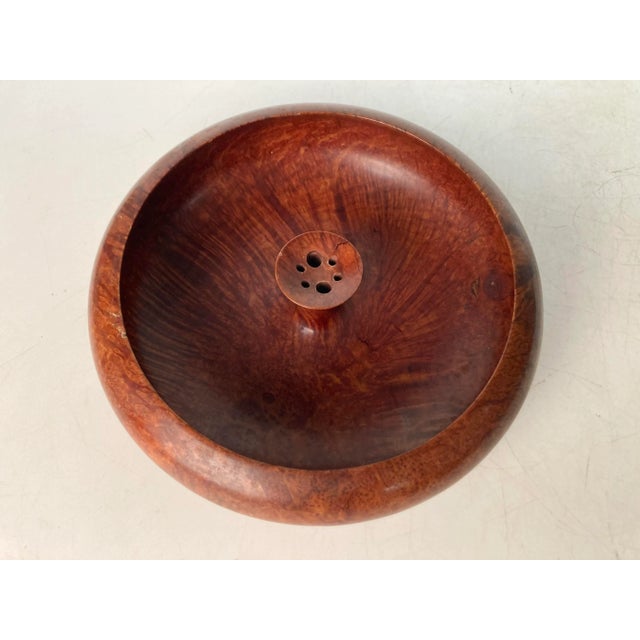A Mid Century turned Nut Bowl likely from California with great color and form. A central turned Pedestal has drilled...
