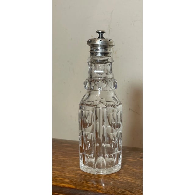 Up for sale is a wonderful antique mid 19th century James Dixon & Sons muffineer dredger. It has a stunning cut crystal...