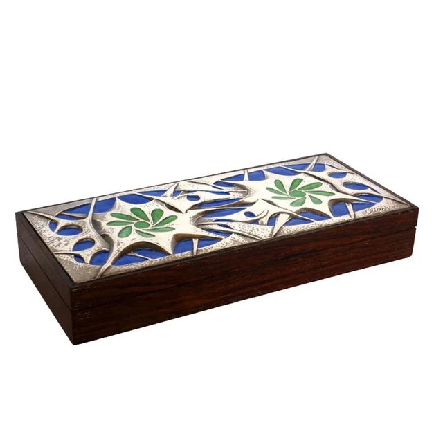 Box Ottaviani Italy, 1970 Silver thrown with blue and green enamels Wooden box This piece has an attribution mark, I am...