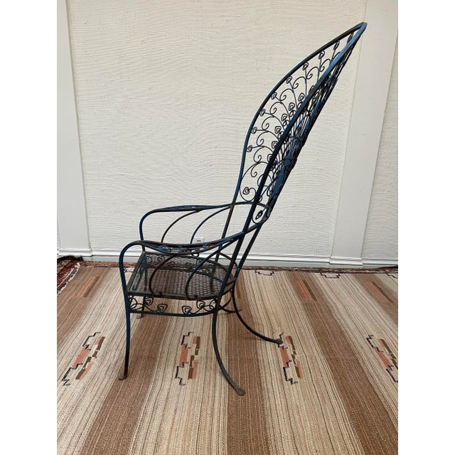 Exceptional iron peacock chair. The details of this a chair are amazing. Notice how well the chair is designed with the...