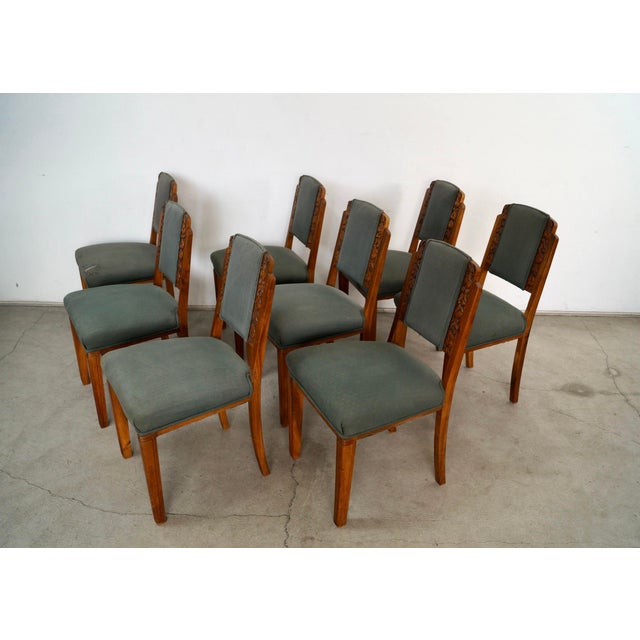 1930's original Art Deco dining chairs for sale. It's a set of eight chairs, and are made of solid walnut. They have an...