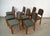 1930's original Art Deco dining chairs for sale. It's a set of eight chairs, and are made of solid walnut. They have an...