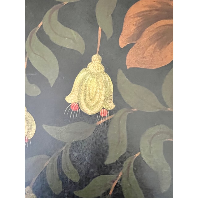 A beautiful hand painted tole tray. The dimensions are 29-3/38" by 21-7/8". The tray is quite large with inset handles.