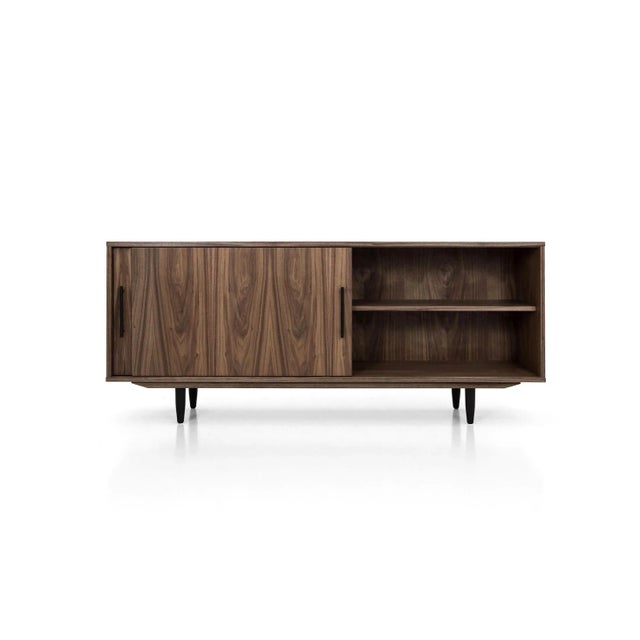 This dresser is a minimalist masterpiece in a compact form. The furniture is equipped with two pairs of sliding doors,...
