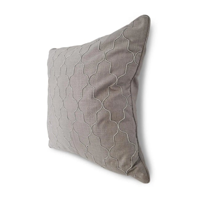 Grey linen square pillow with silver Moorish pattern embroidery on front. Comfy plush down insert.