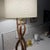 A striking American Mid-Century Modern table lamp dating to the 1960s, constructed from sculpted solid hardwood elements...