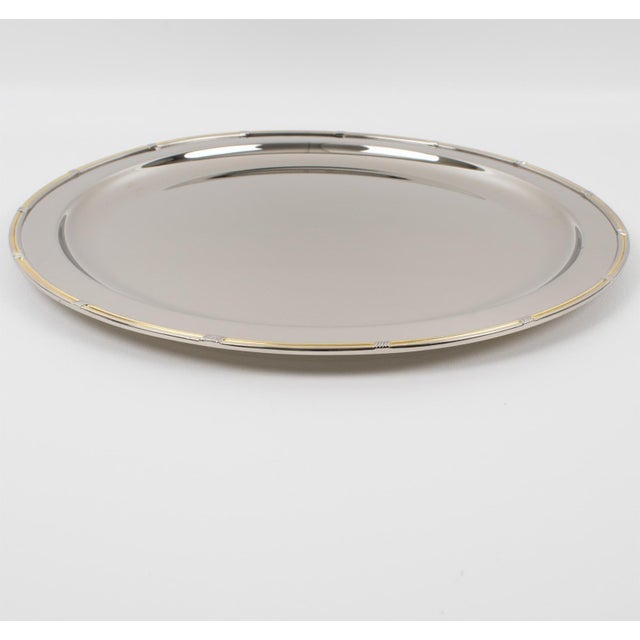 Crafted by the legendary House of Gucci, Italy, circa 1980, this exceptional silver plate barware serving tray epitomizes...
