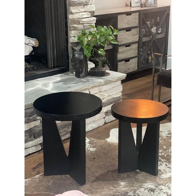 Uttermost Modern and sophisticated, this set of two nesting tables features strong angular lines and is layered in dark...