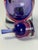 A substantial Murano glass decanter from the 1980s, attributed to Formia, with a compact bottle form and vivid purple and...
