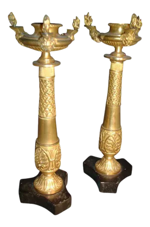 19th Century Gilt Bronze Egyptian Revival Candlesticks or Torchiere in the manner of Thomas Hope Ormolu with Black Marble Bases - a Pair