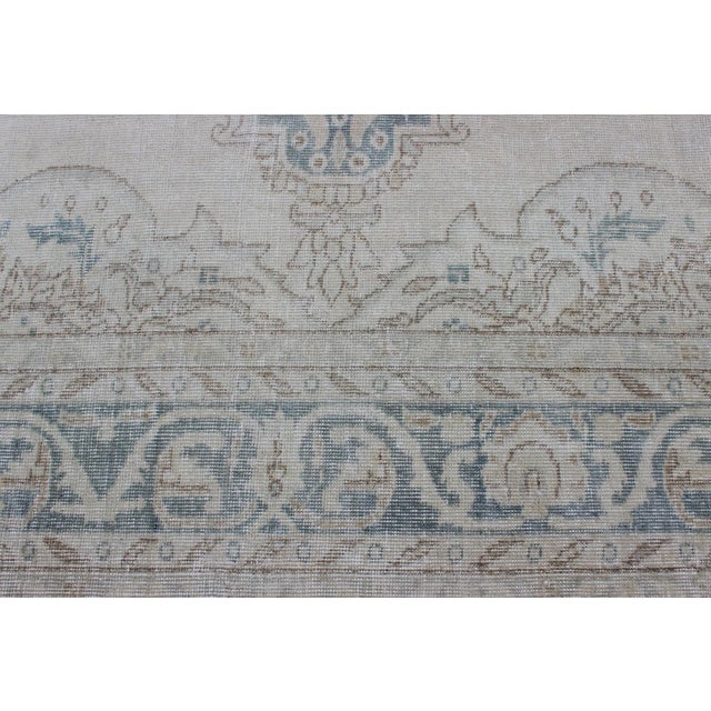 Medallion Distressed Oushak Turkey in Cream, Blue Tones, Brown and Teal Blue For Sale - Image 9 of 15