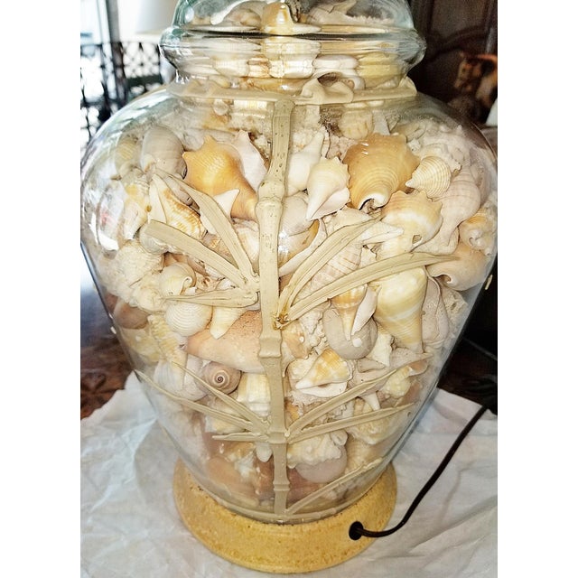 Here's a fun coastal shell filled table lamp on painted bases. Applied simulated branch coral to the glass base, 1980s...