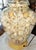 Here's a fun coastal shell filled table lamp on painted bases. Applied simulated branch coral to the glass base, 1980s...