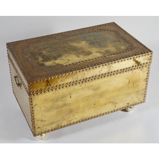 A vintage Sarreid Ltd. Hollywood Regency brass-clad trunk or chest. Perfect for storage.