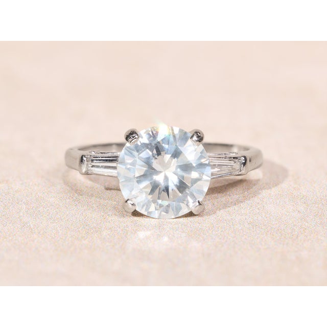 The Harbison Canyon Antique Platinum Engagement Ring set with 1.90 Carat Diamond. At the center is a 1.90 carat round...