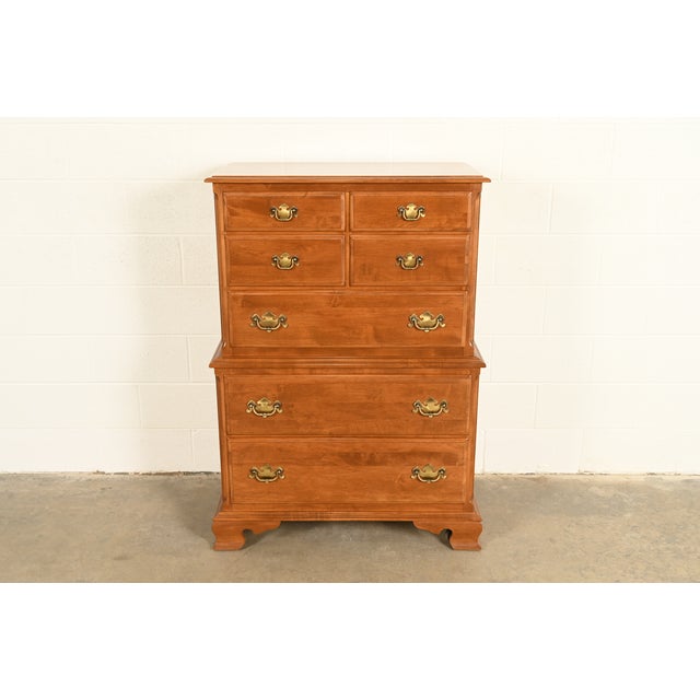 A gorgeous Early American, Georgian, or Chippendale style seven-drawer highboy dresser or chest of drawers By Ethan Allen...