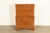 A gorgeous Early American, Georgian, or Chippendale style seven-drawer highboy dresser or chest of drawers By Ethan Allen...