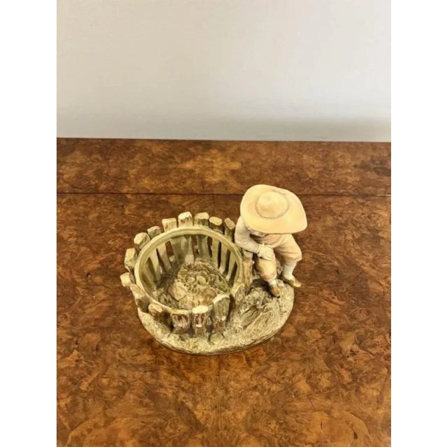 Fantastic quality antique Royal Worcester figure with a basket having a quality Royal Worcester figure with a basket...