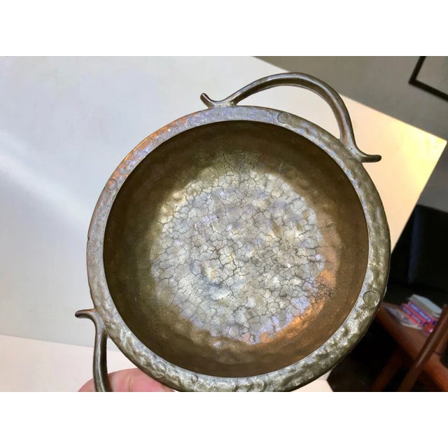 Chocolate dish or decorative charger in cast bronze. It has a superficially aged surface that imitates ancients bronze...