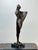 This striking Bronze “Draped Woman” on Marble Base, signed “HH” (possibly the work of Finnish artist Helvi Hyvärinen),...
