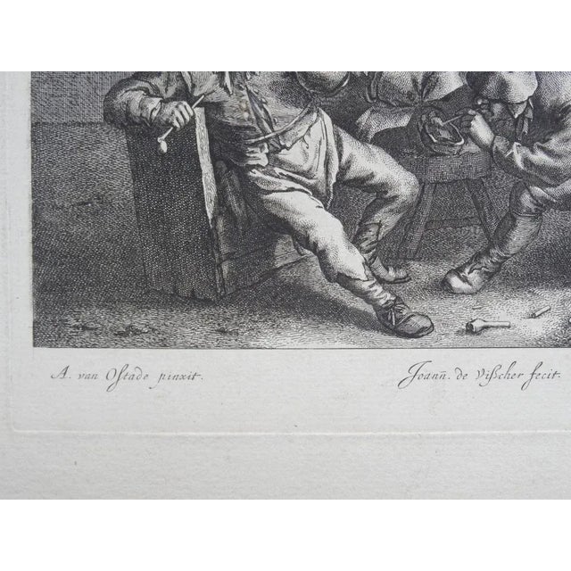 In a tavern. engraver Jan De Visscher (1933-1692) Paper, engraving, 21x25 cm This piece is attributed to the mentioned...