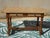 Antique, traditionally crafted solid oak desk, assembled with wooden dowels. This rustic-style desk features a beautiful...