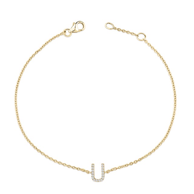 Immerse yourself in the understated elegance of this 10K yellow gold bracelet, for an enrapturing shimmer that captures...