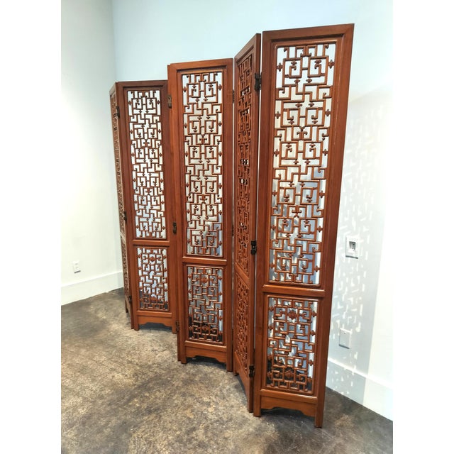 Chinese carved rosewood 6 panel screen with traditional geometric design denoting luck. Heavy, beautifully-aged rosewood....