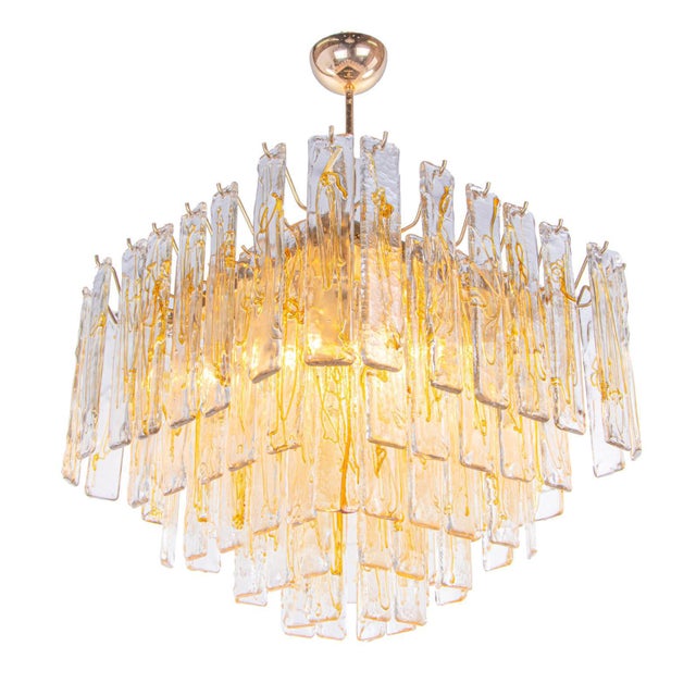 Elegant large murano glass chandelier with hand blown amber textured glass panels on a gold plated brass frame....