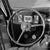 The photographer's note regarding this work is "Steering wheel at the driver's seat of a Ford V8, Germany 1930s." This...