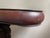 A richly carved late 19th‑century Continental Rococo Revival gueridon table in solid mahogany, featuring a rotating...